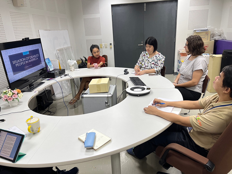 Intern Ms. Elizabeth presenting on the situation of persons with disabilities in America during in house training and the continuation of her final presentation from her internship program.
