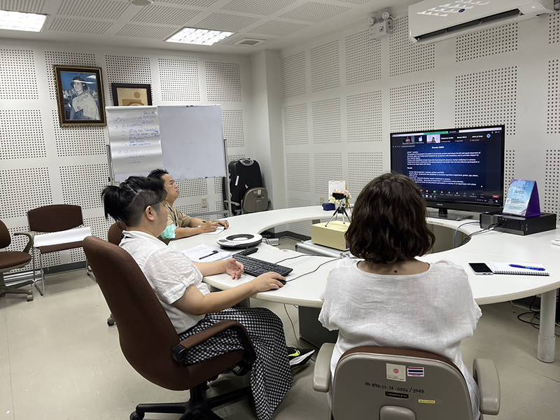 Ms. Supaanong Panyasirimongkol giving a speech at webinar on legal capacity laws in Asia Pacific. Mr. Watcharapol Chuengcharoen, Chief of Networking and Collaboration and an intern, Miss Elizabeth Johns observing.