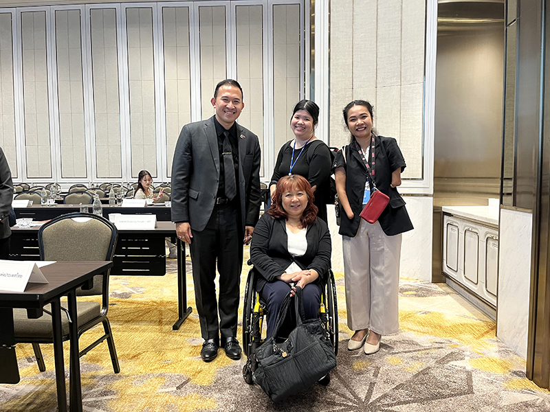 APCD Representative featuring group photo with Assistant Professor Dr. Bhanubhatra and Ms. Saowalak Thongkuay, Chairperson, ASEAN Disability Forum (ADF)