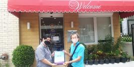 Mr. Wanchai Suwatsiripon, Manager of World Endeavors Thailand office, received the APCD publication.