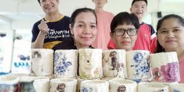 Members of the Dao Ruang Group gather for a group photo after a successful fundraising event on the half day activity.